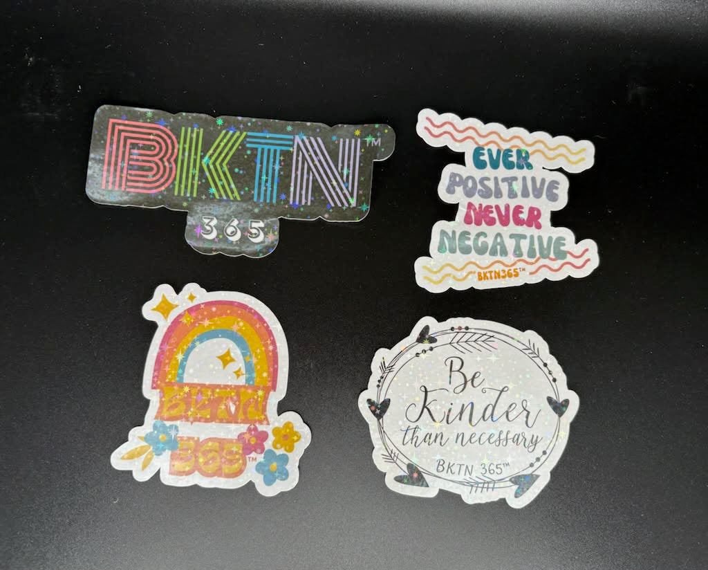 Four Your Kind Mind positive affirmation stickers with holographic sparkle featuring BKTN 365, Ever Positive Never Negative, and Be Kinder Than Necessary designs.